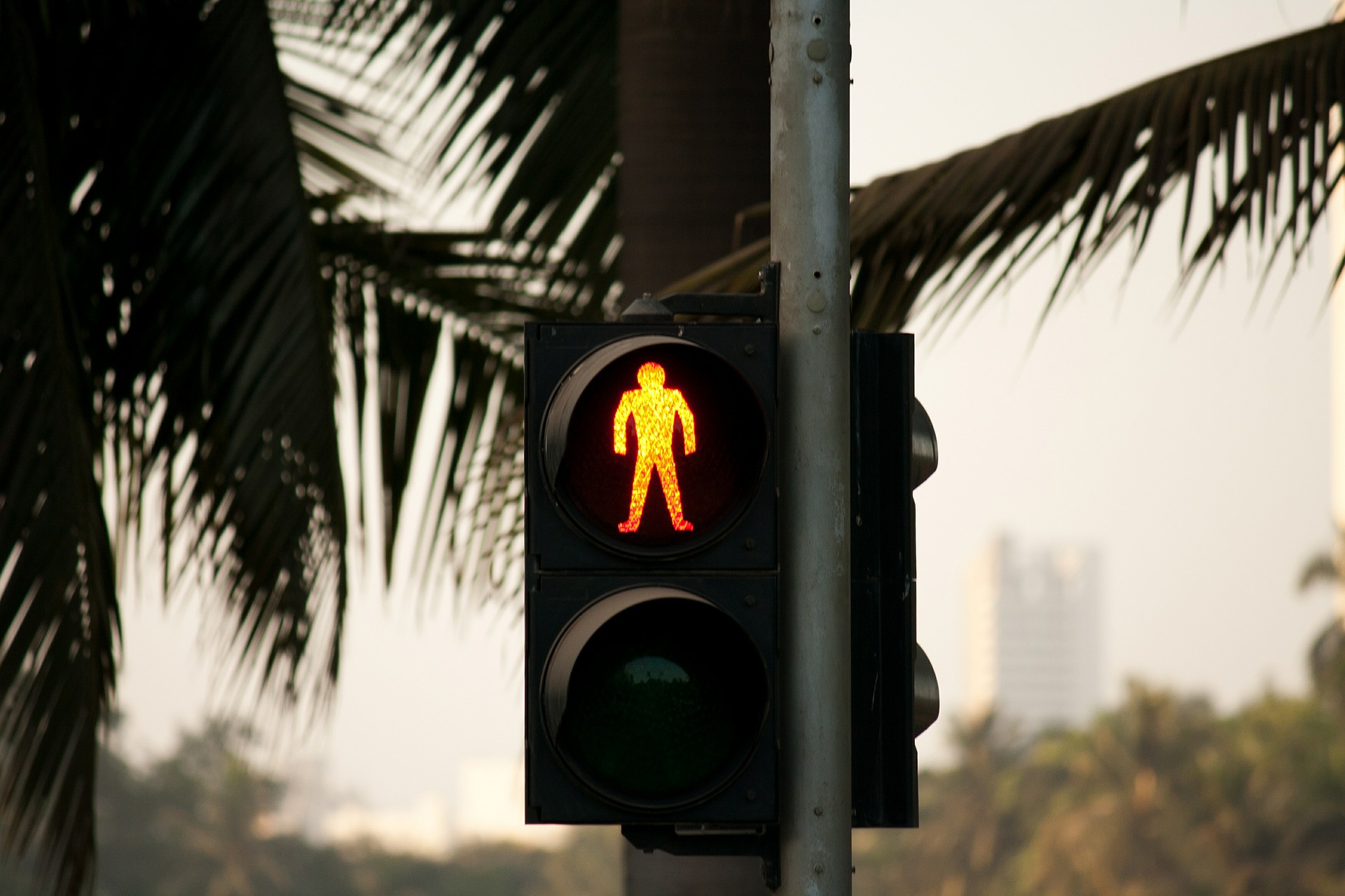 A traffic post showing red light